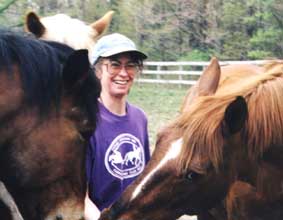 Dr. Valentine with her horses.